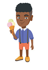 Image showing Little african boy holding an ice cream cone.