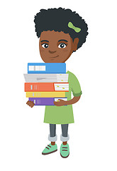 Image showing African school child holding pile of textbooks.