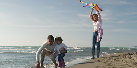 Image showing Young family enjoying vecation during autumn