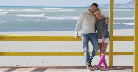 Image showing Couple chating and having fun at beach bar