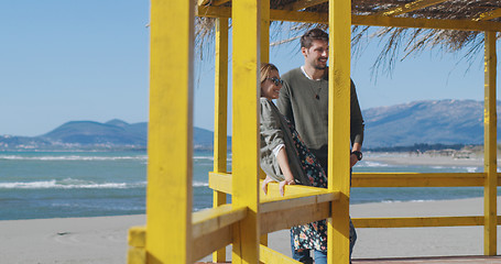 Image showing Couple chating and having fun at beach bar