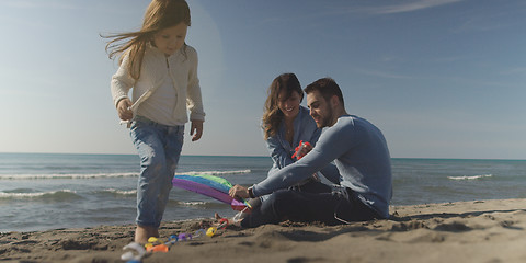 Image showing Young family enjoying vecation during autumn