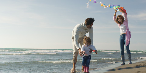 Image showing Young family enjoying vecation during autumn