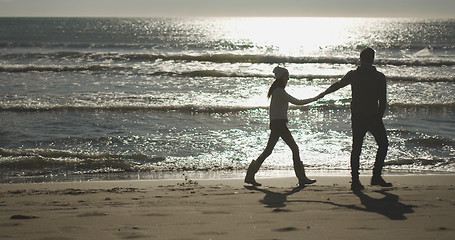 Image showing Romantic Couple Relaxing On The Beach