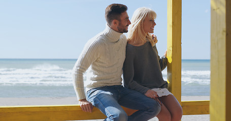 Image showing Couple chating and having fun at beach bar