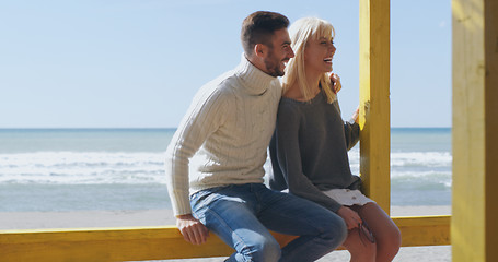 Image showing Couple chating and having fun at beach bar