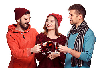 Image showing Smiling european men and women during party photoshoot.