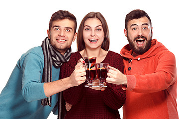 Image showing Smiling european men and women during party photoshoot.