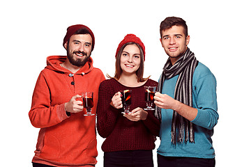 Image showing Smiling european men and women during party photoshoot.