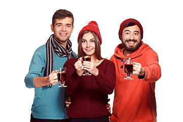 Image showing Smiling european men and women during party photoshoot.