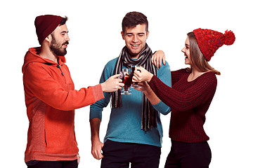 Image showing Smiling european men and women during party photoshoot.