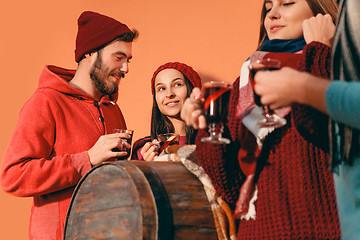 Image showing Smiling european men and women during party photoshoot.