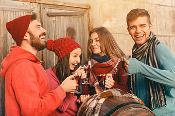 Image showing Smiling european men and women during party photoshoot.