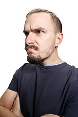 Image showing Serious business man standing on white studio background