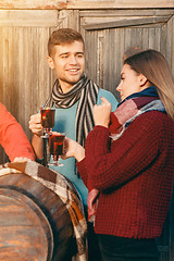 Image showing Smiling european men and women during party photoshoot.