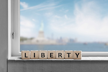 Image showing Liberty sign in a window sill with a view