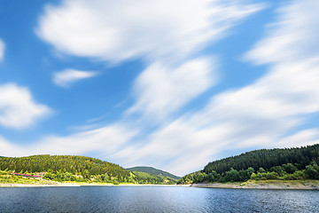 Image showing Large lake under a blue sky in the wind