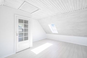Image showing Bright room with the sun shining through a small window