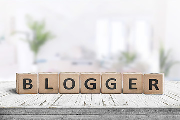 Image showing Blogger sign in a bright living room with green plants