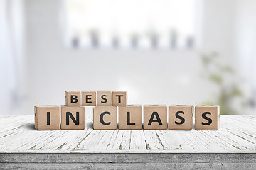 Image showing Best in class sign on a wooden table