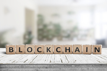 Image showing Blockchain sign made of wood on a desk