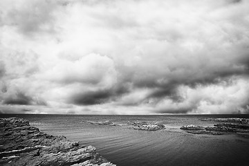 Image showing Cliffs by the shore of the sea