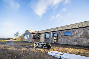 Image showing New house made of bricks at a construction site