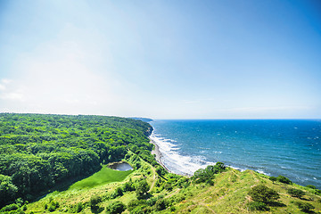 Image showing Ocean view over a valley by the sea