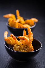 Image showing Roastet and breaded Thai shrimps with dip