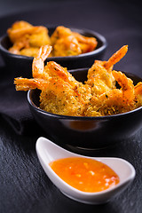 Image showing Roastet and breaded Thai shrimps with dip