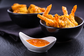 Image showing Roastet and breaded Thai shrimps with dip