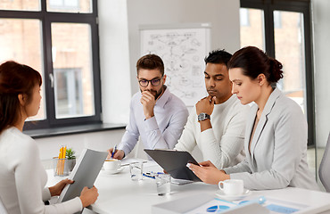 Image showing recruiters having job interview with employee