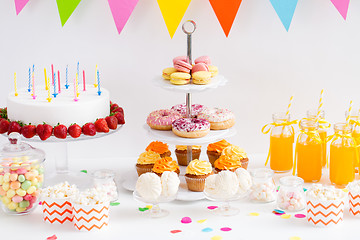 Image showing food and drinks on table at birthday party