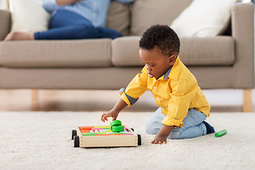 Image showing african american baby boy playing with toy blocks