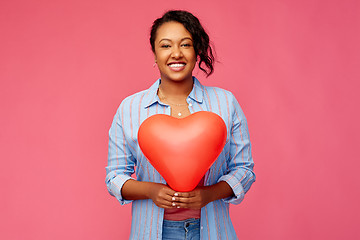 Image showing african american woman with heart-shaped balloon