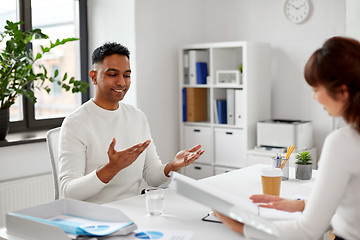 Image showing employee having interview with employer at office