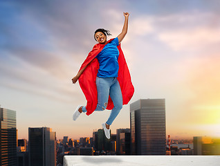 Image showing happy african american woman in superhero red cape