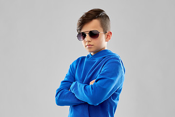 Image showing portrait of boy in sunglasses with crossed arms