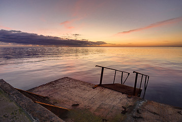 Image showing Concrete sea wharf against the backdrop of a beautiful evening landscape