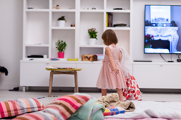 Image showing mother and little daughter spending time together at home