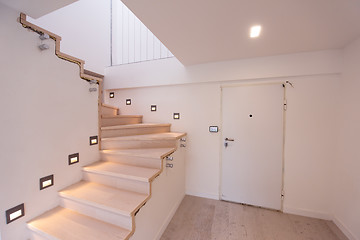 Image showing stylish interior with wooden stairs