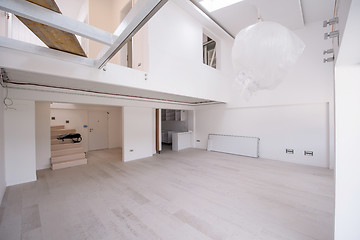 Image showing Interior of empty stylish modern open space two level apartment