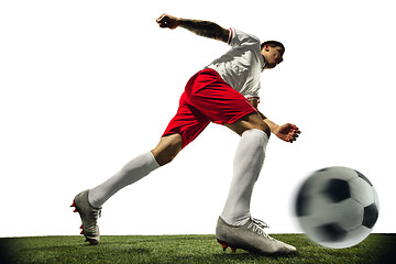 Image showing Football or soccer player on white background - motion, action, activity concept