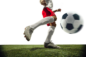 Image showing Football or soccer player on white background - motion, action, activity concept