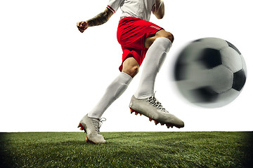 Image showing Football or soccer player on white background - motion, action, activity concept