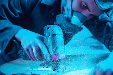 Image showing Skater in process of making his own skateboard, longboard - open business concept