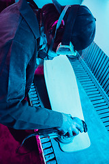 Image showing Skater in process of making his own skateboard, longboard - open business concept