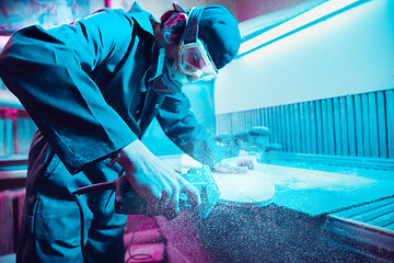 Image showing Skater in process of making his own skateboard, longboard - open business concept