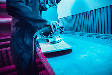 Image showing Skater in process of making his own skateboard, longboard - open business concept