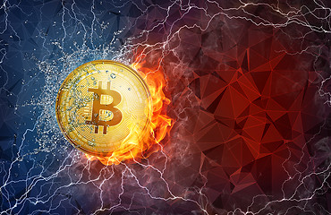 Image showing Golden bitcoin coin hard fork in fire flame, lightning and water splashes.